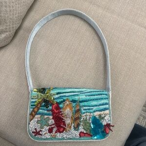 Viral beaded surfboard bag